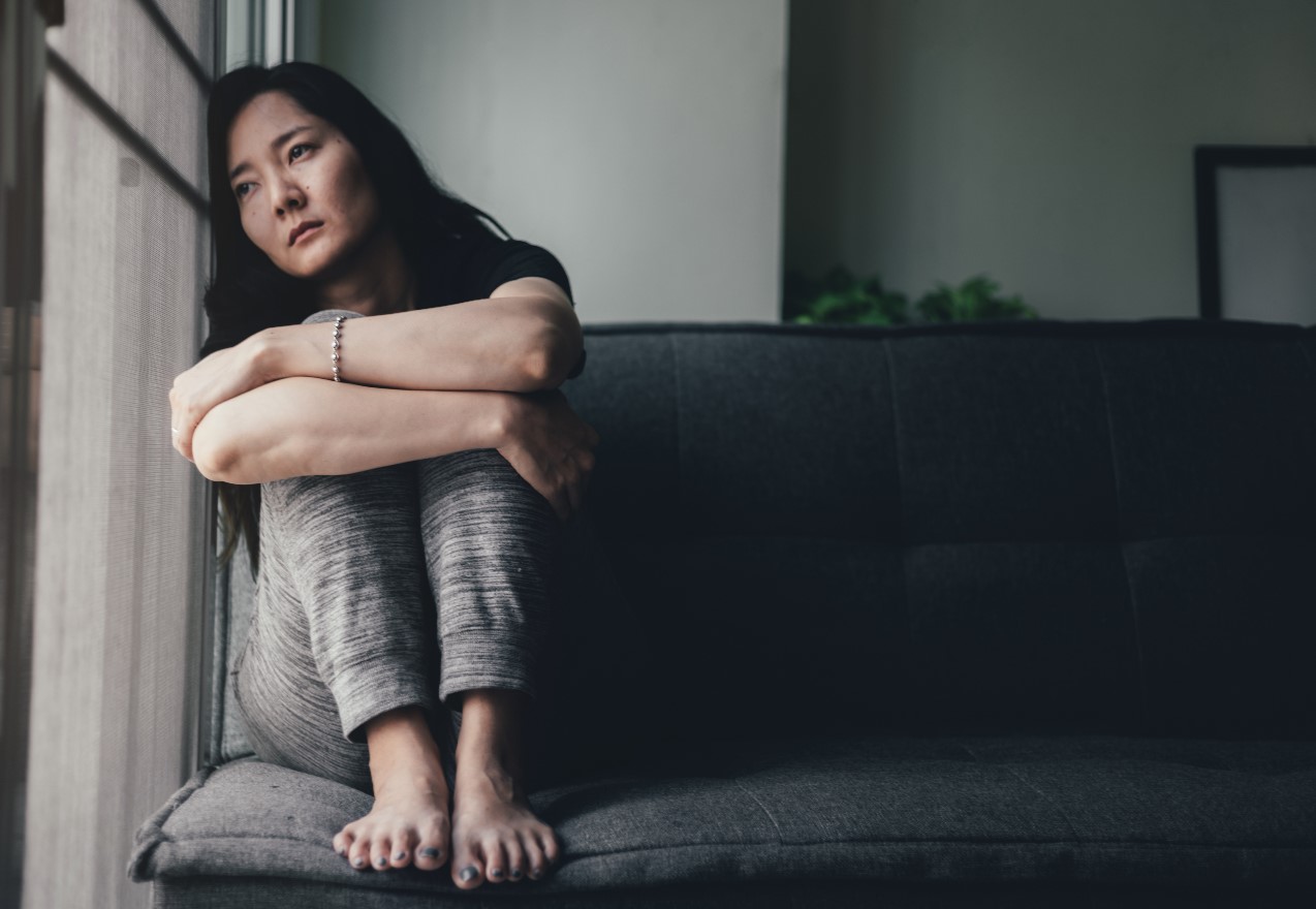 Woman looking sad and despondent